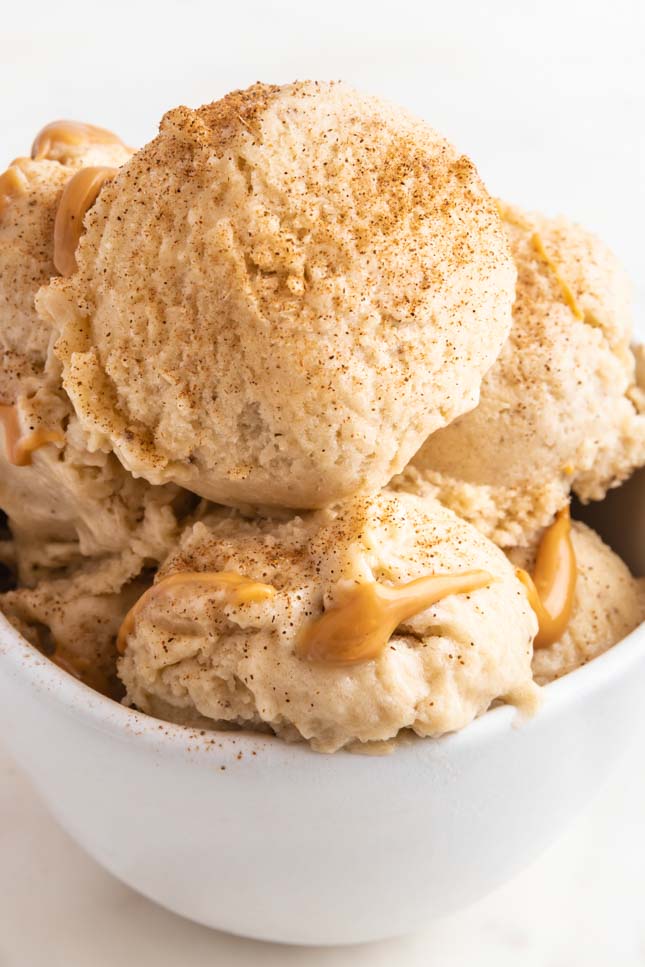 Close-up shot of a bowl with 2 scoops of banana ice cream