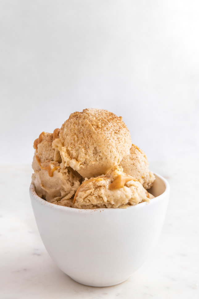 Side shot of a bowl of banana ice cream