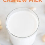 A picture of a glass of cashew milk with the words cashew milk