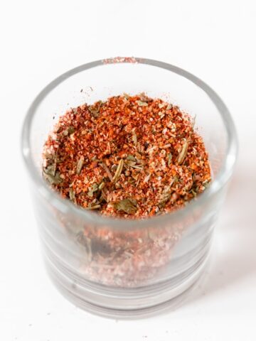 Photo of a glass jar of homemade chicken seasoning