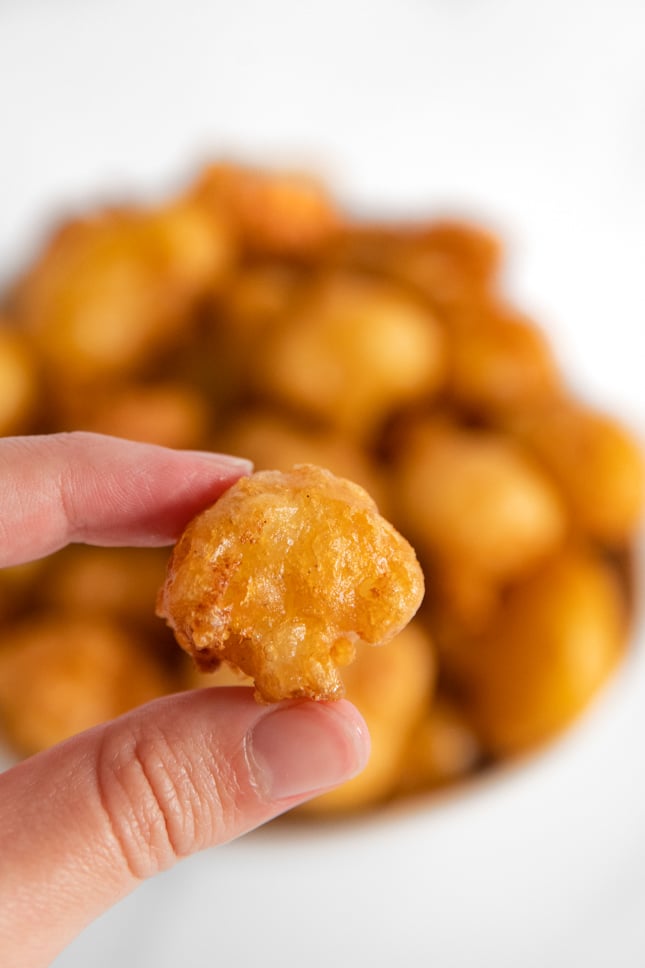 Close-up photo of a piece of fried cauliflower