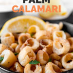 Close-up shot of a bowl of hearts of palm calamari with the words hearts of palm calamari