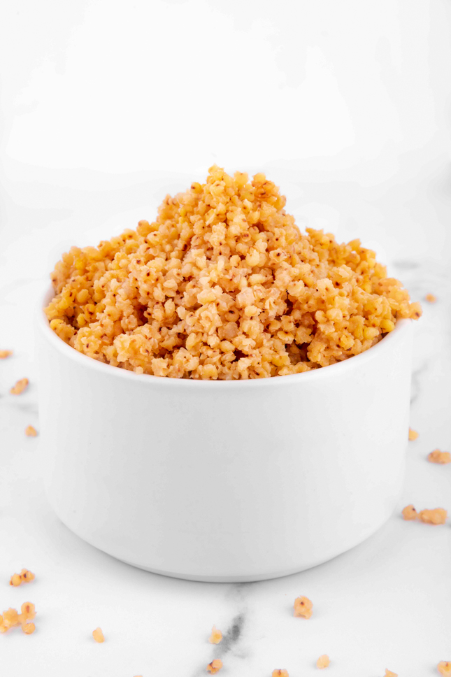 Side photo of a bowl of cooked millet