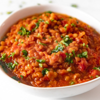 Square photo of a bowl of lentil soup
