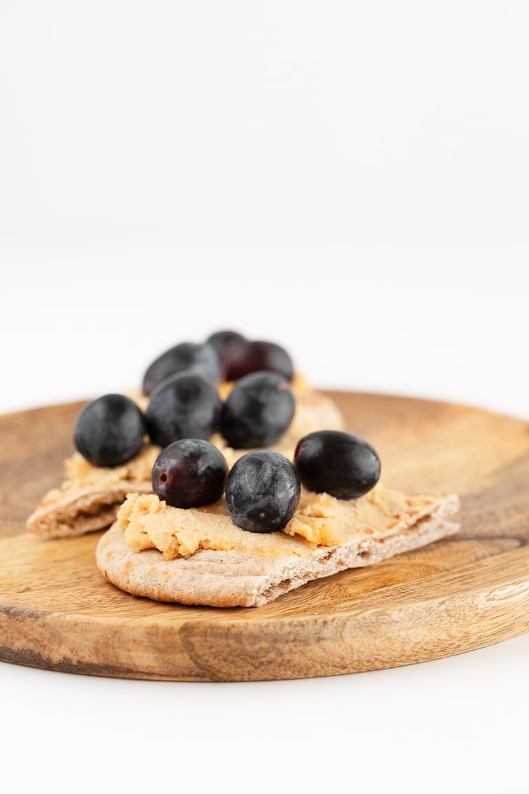 Macadamia Nut Cheese. - This macadamia nut cheese is one of my favorite vegan cheeses, only requires 8 ingredients and is ready in 10 minutes. It's the perfect appetizer or snack! #vegan #glutenfree #simpleveganblog