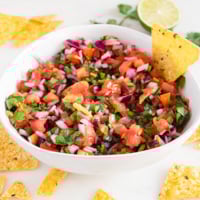 Square photo of a bowl of pico de gallo
