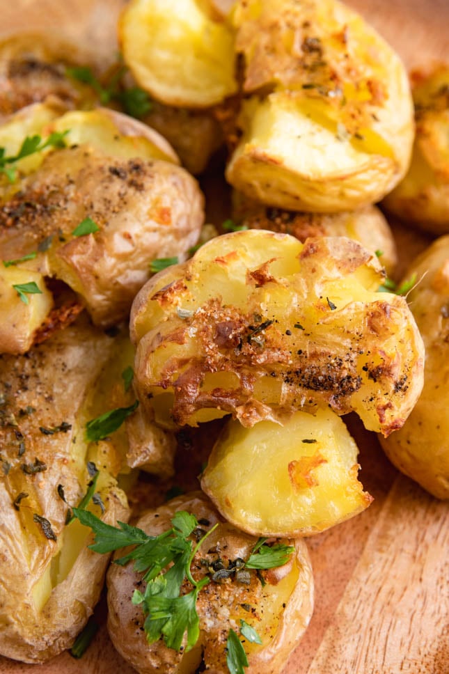 Close-up shot of a plate of smashed potatoes