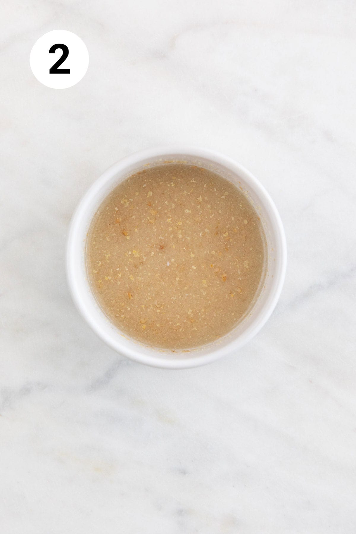 A small bowl with homemade flax eggs.