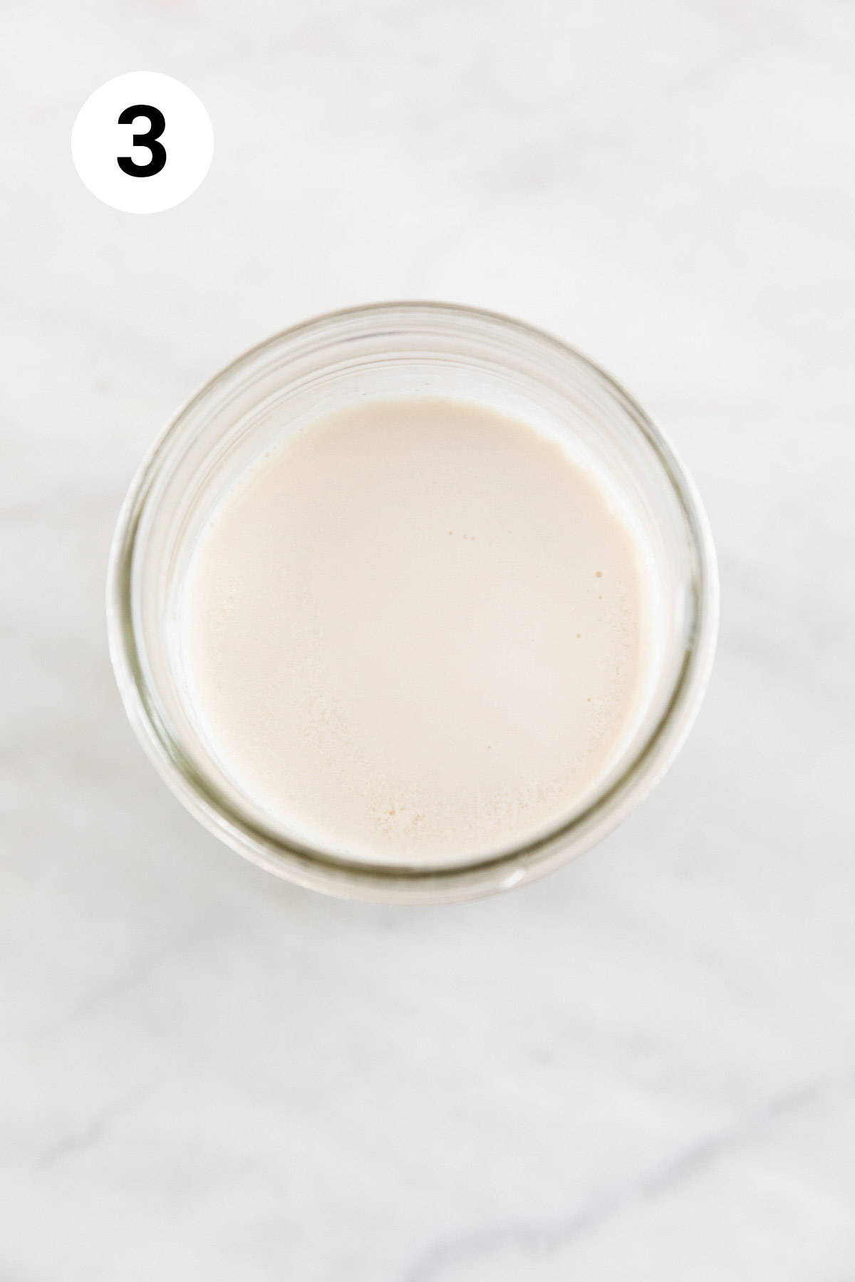 A jar with homemade vegan buttermilk.