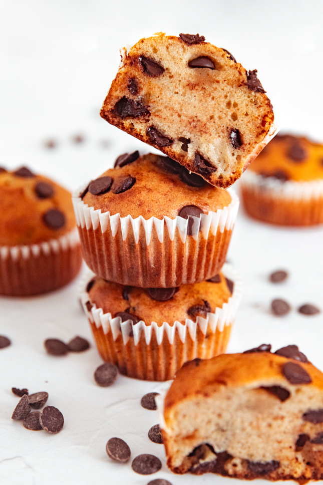 Side photo of a pile of vegan banana muffins