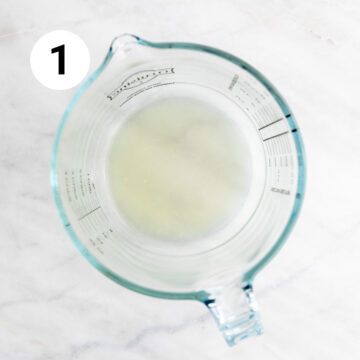 Measuring jar with lemon juice.
