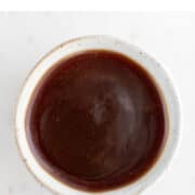 Small bowl of vegan caramel sauce.