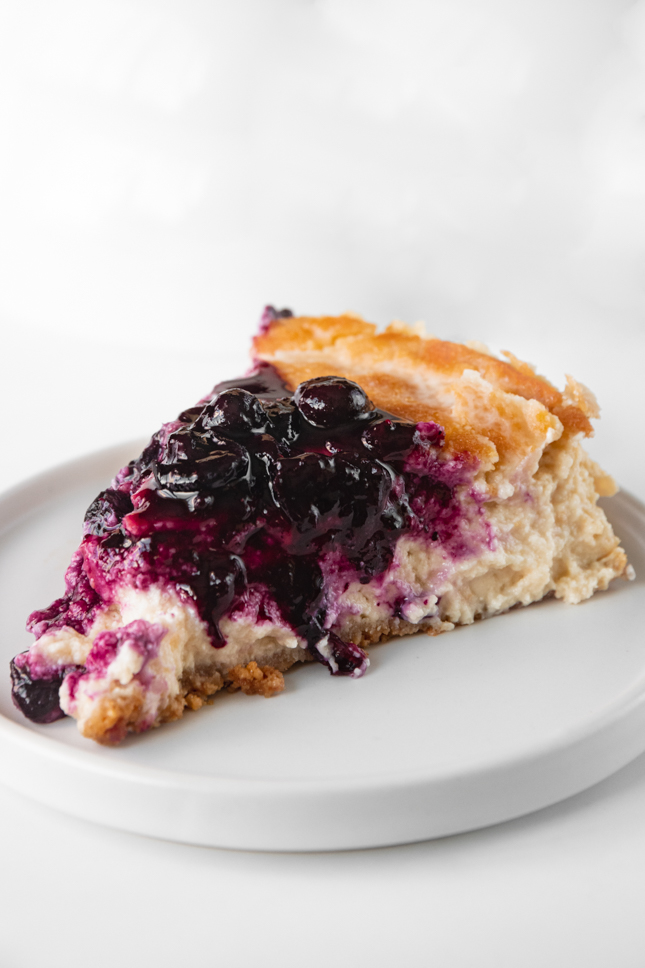 Photo of a slice of vegan cheesecake