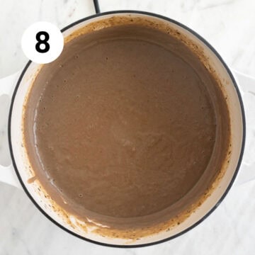 Blended vegan cream of mushroom soup in a pot.