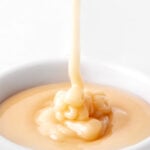 Close-up photo of a bowl of vegan icing with a title
