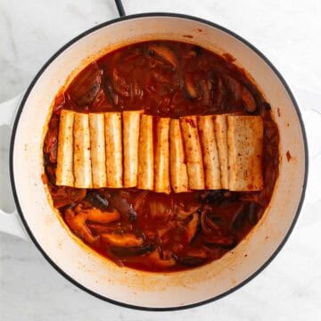 Vegan kimchi stew in a large pot.