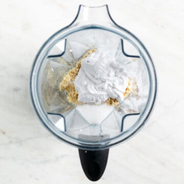 Vegan mascarpone ingredients in a blender jar before blending.
