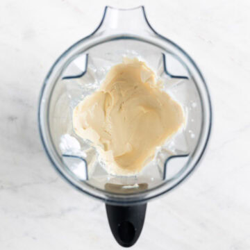 Vegan mascarpone in a blender jar.