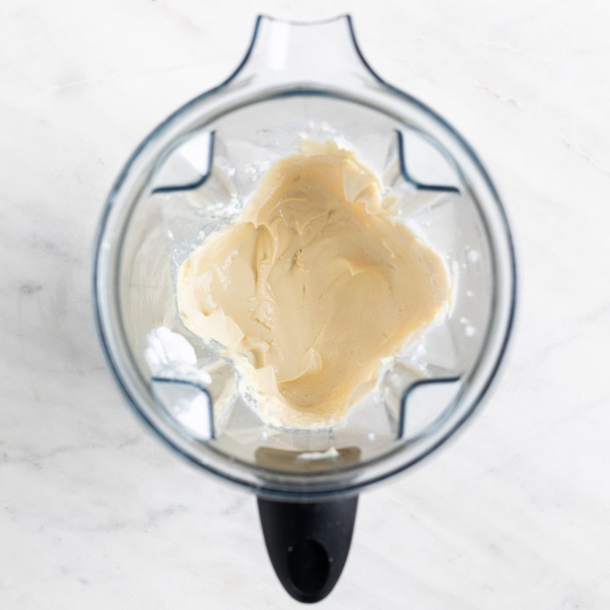 Vegan mascarpone in a blender jar.