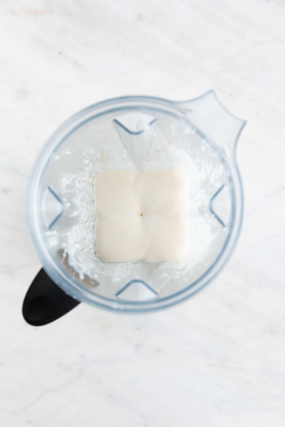 The vegan mayonnaise once it has emulsified in a high-speed blender.
