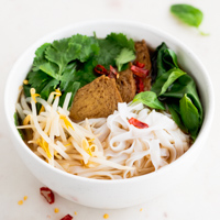 A square picture of a bowl with vegan pho made from scratch