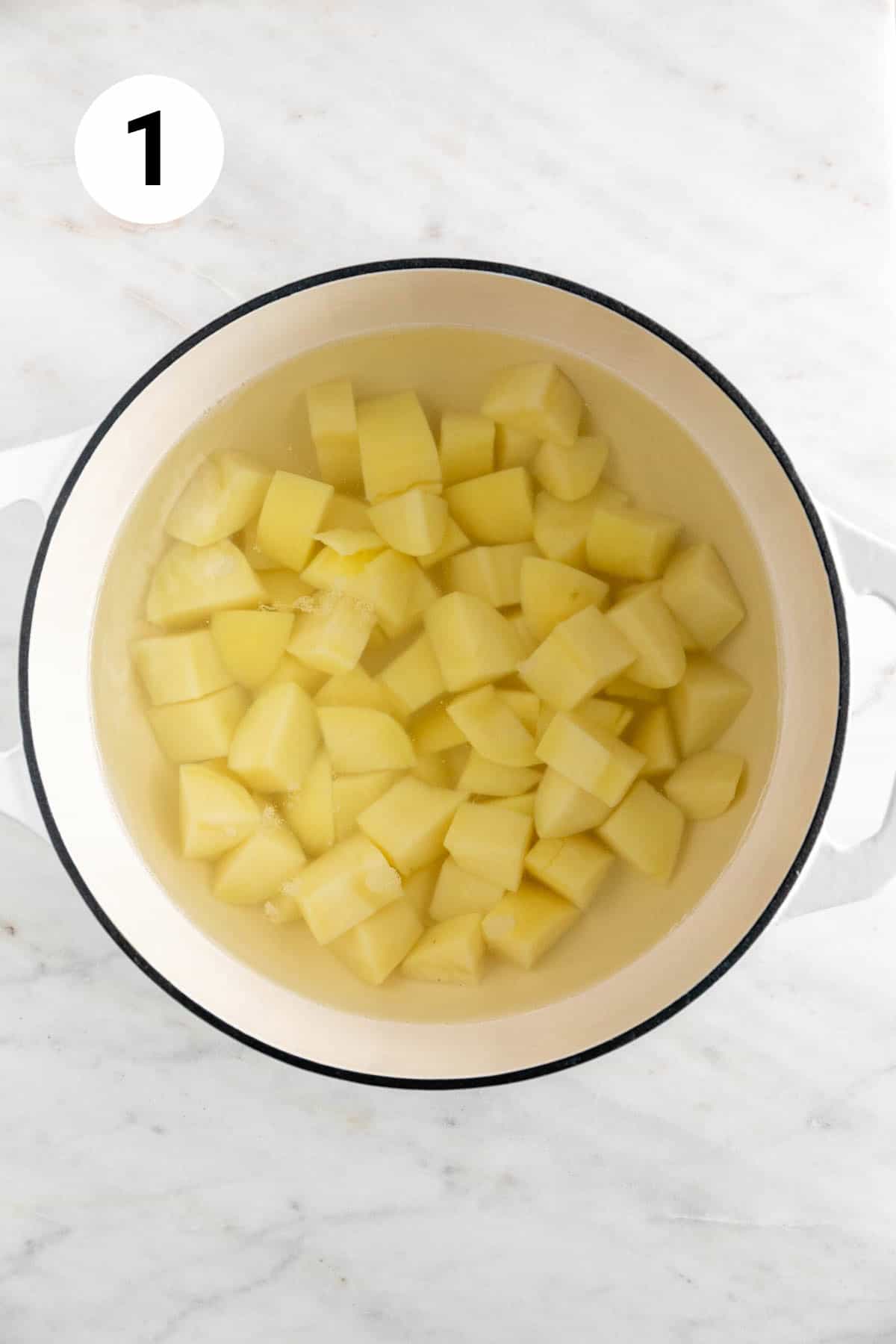 A large pot of boiled potatoes.