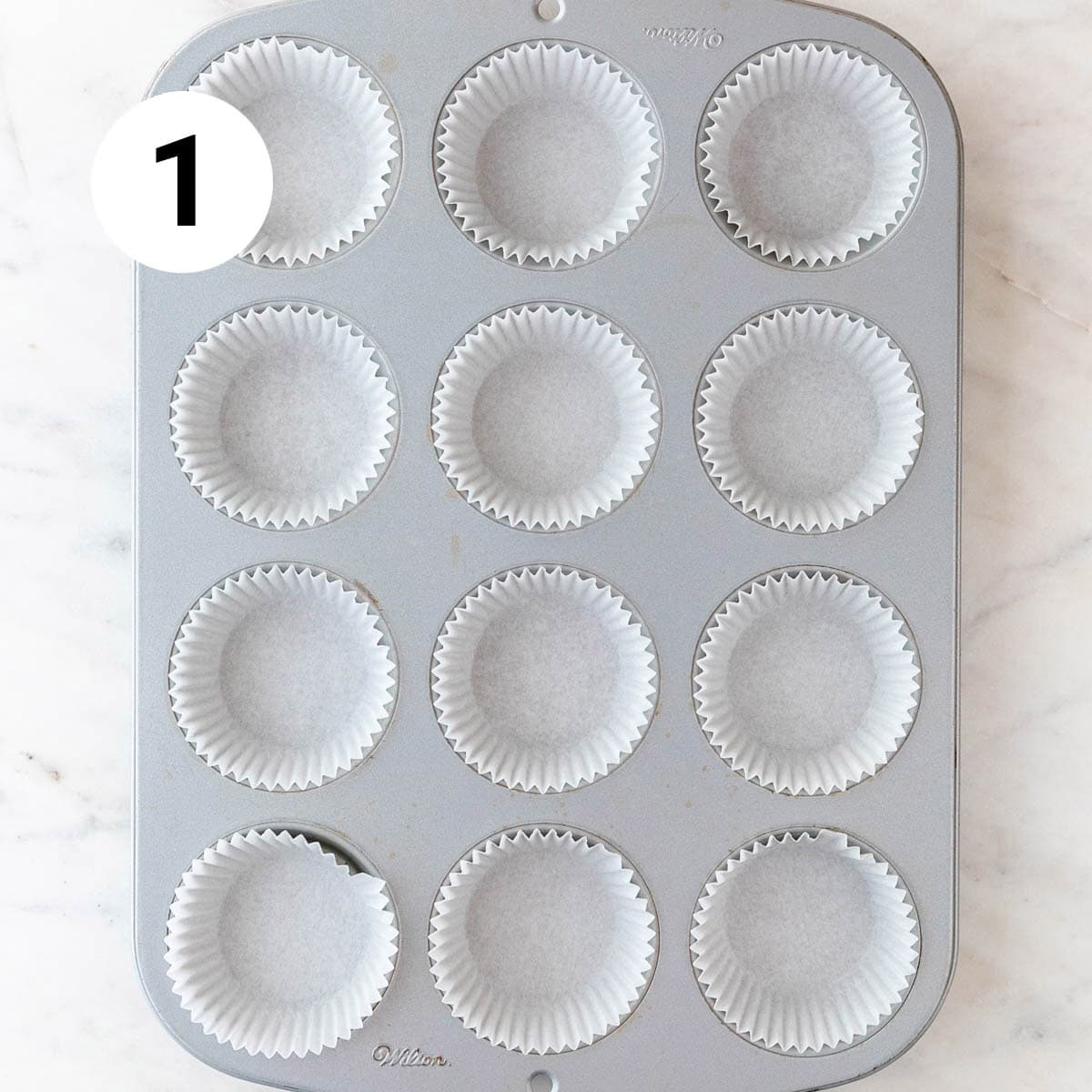 Muffin pan with liners.