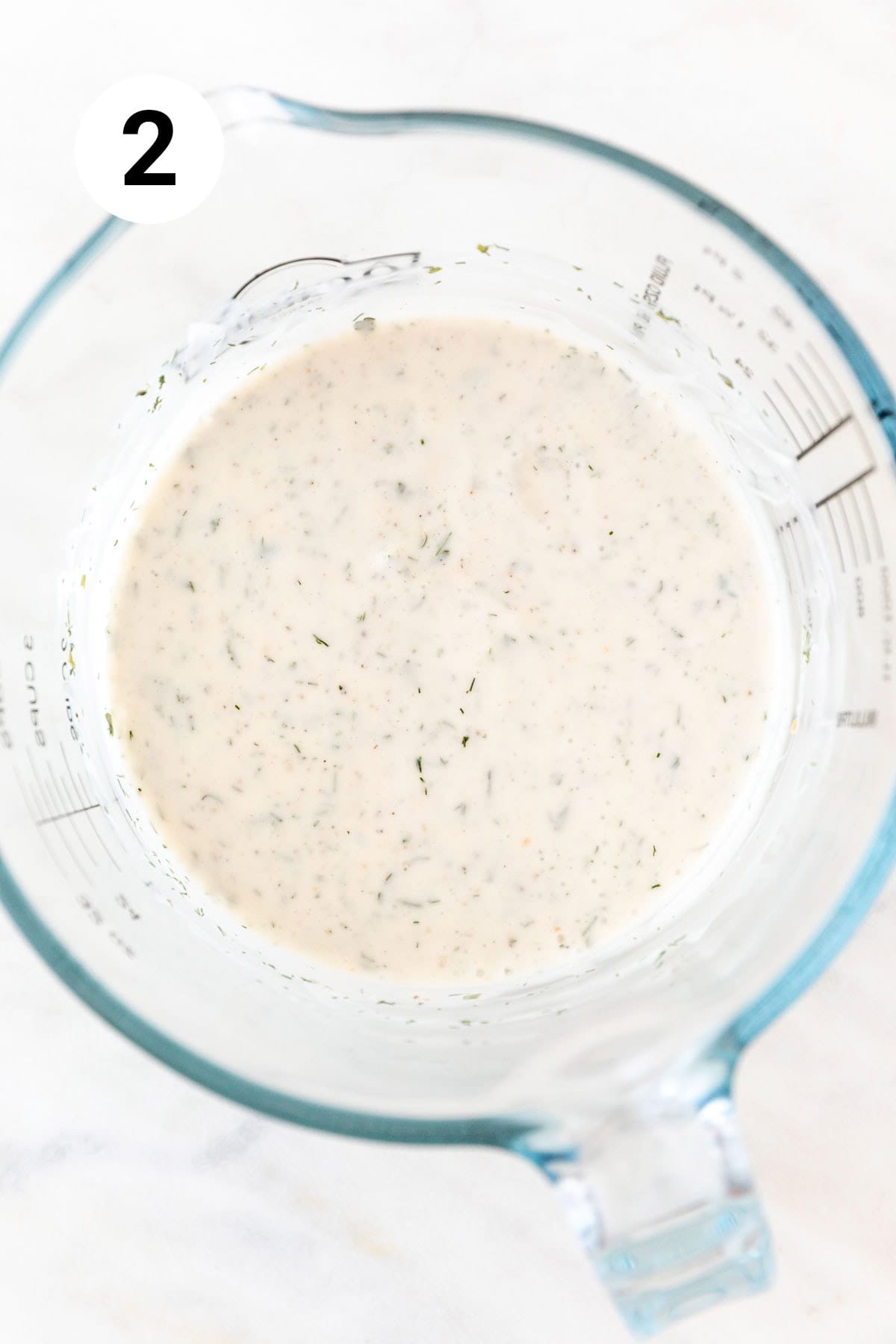 Vegan ranch dressing fully mixed in a jar.