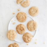 Photo from above of a white dish with vegan snickerdoodles