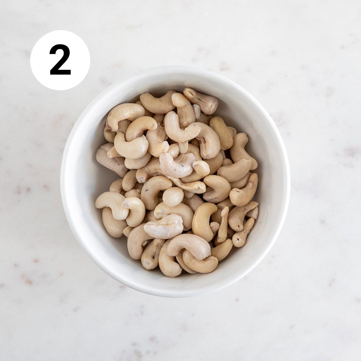 Drained and rinsed chickpeas in a bowl.